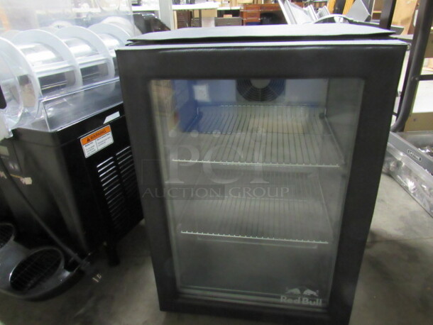 One Counter Top Vestfrost Red Bull Glass Door Cooler With 2 Racks, And Black Padded Cover. Model# VC206484016. 115 Volt. CLEAN!!!! - Image 1 of 4