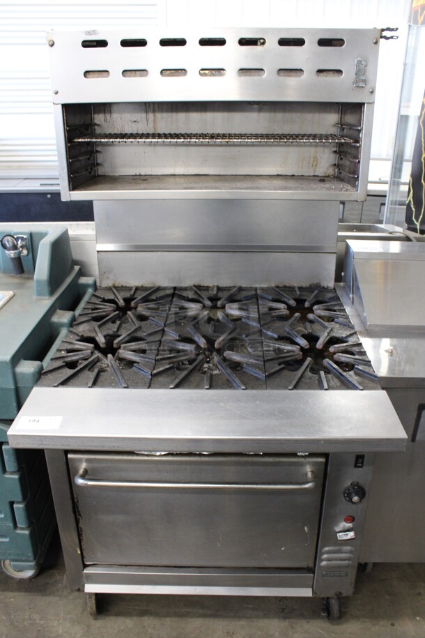 Montague Stainless Steel Commercial Propane Gas Powered 6 Burner Range w/ Convection Oven and Cheese Melter on Commercial Casters. 36x42x72