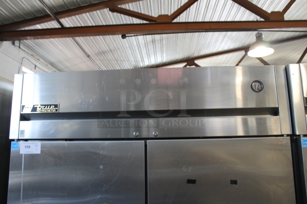 2012 True TG2R-2S ENERGY STAR Stainless Steel Commercial 2 Door Reach In Cooler w/ Poly Coated Racks on Commercial Casters. 115 Volts, 1 Phase. Tested and Working! - Image 2 of 7