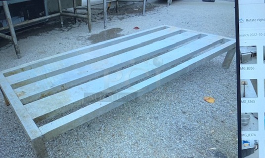 One 60X24X8.5 Aluminum Dunnage Rack.