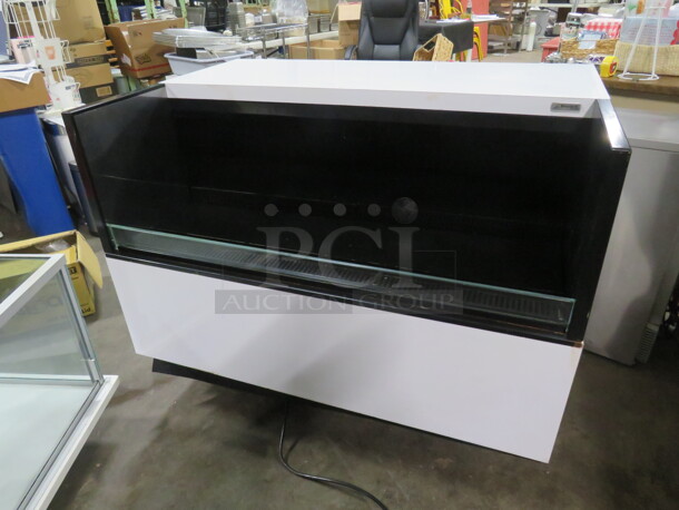 One WORKING Oasis Structural Concepts Under Counter Air Curtain Merchandiser With Manual. 47X32X34. Model# CO43R. 120 Volt. $9341.10. - Image 1 of 7