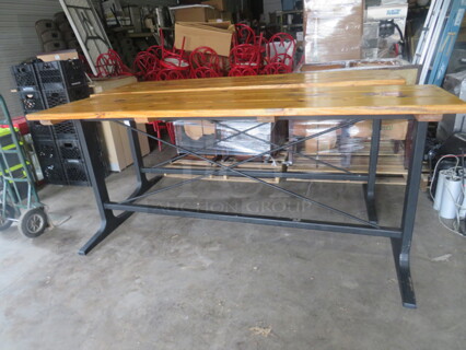 One Wooden Table Top, With An Umbrella Hole, No Holder,  On A Bar Height Black Industrial Base. 95X28X42