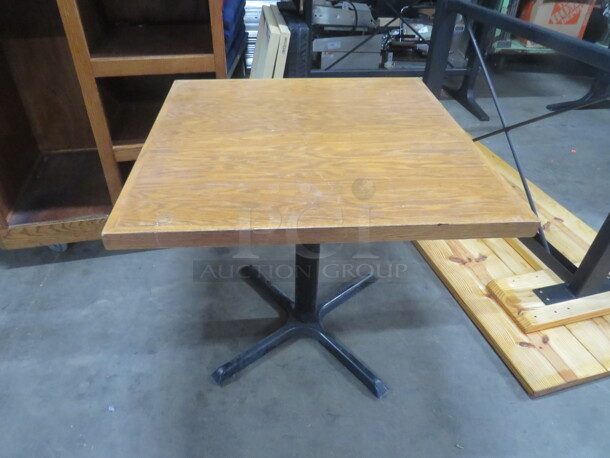 One Wooden Table Top  On A Pedestal Base. 32X32X29