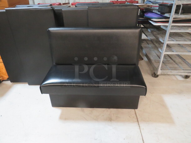 One Single Sided Black Cushioned Booth. 42X23X35