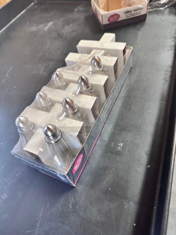 New! Tablecraft 83S&P 1 Ounce 4.38 inch x 1.88 inch Clear Glass Eiffel Tower Salt and Pepper Shakers with Nickel Plated Tops NSF  - Image 2 of 4