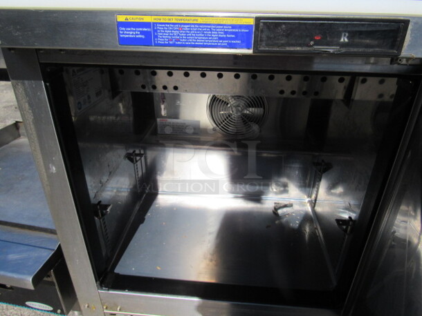 One SS Everest 1 Door Refrigerated Prep Table With Cutting Board On Casters. Model# EPBNR1. 115 Volt. 28X32X43.5 - Image 2 of 4