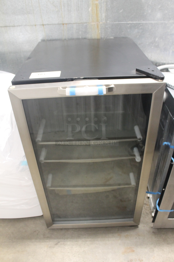 BRAND NEW SCRATCH AND DENT! Danby DBC039A1BDB Commercial Black Undercounter Beverage Cooler With Glass Door Trimmed In Stainless Steel And Steel Shelves. 115V. Tested And Working!