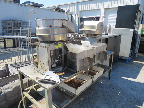 One Gold Medal Cretors Dual Popcorn Machine On A Stainless Steel Work Table With 3 Scoops. Model# G32FP. 120/208 Volts. 75X30X62.   - Image 3 of 3