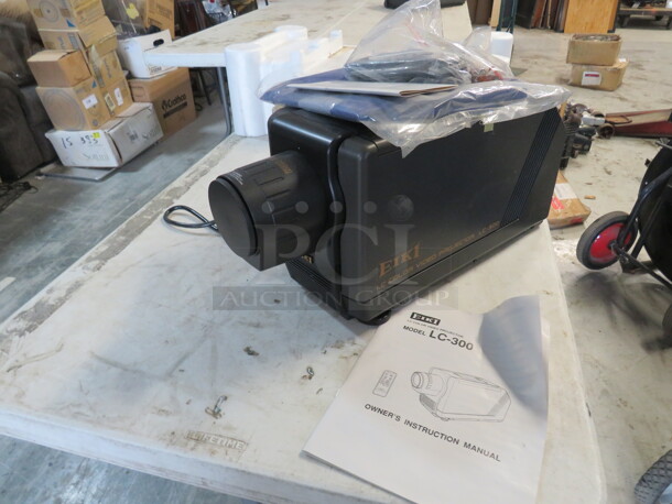 One NEW EIKI LC-300 LC Color Video Projector With Manual Remote And Cover. - Image 1 of 4