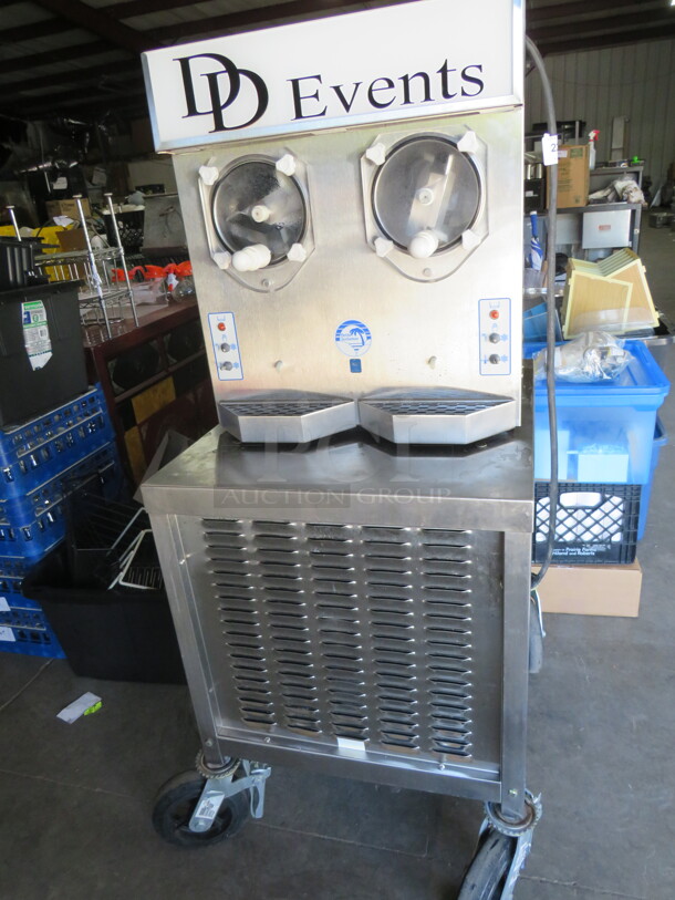One Frosty Factory Dual Margarita Machine On Casters, With 2-12 Quart Hoppers. Model# 215F. 230 Volt. 1 Phase. 24X30X58.5. $10,670.40 - Image 1 of 4
