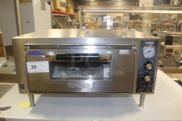 NEW! Waring Model WPO500 Commercial Stainless Steel Countertop Pizza Oven. 27x25x15.5. 120V/60Hz.  - Image 1 of 6