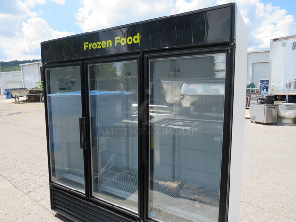 One WORKING TRUE 3 Door Glass Display Freezer With 15 Racks. 115/208-230 Volt. 1 Phase. Model# GDM-72F-LD. 72X32X79.5 - Image 1 of 3