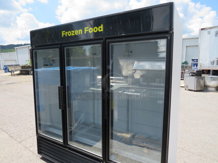 One WORKING TRUE 3 Door Glass Display Freezer With 15 Racks. 115/208-230 Volt. 1 Phase. Model# GDM-72F-LD. 72X32X79.5