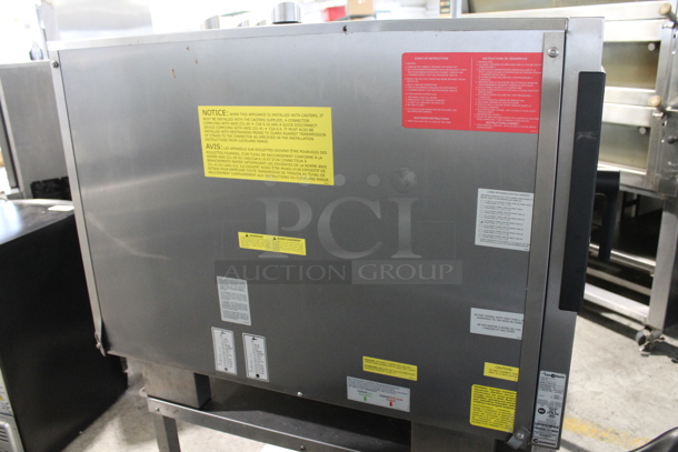 Convotherm C4eT 6.20 GS - N Stainless Steel Commercial Natural Gas Powered Combination Convection Oven on Stainless Steel Equipment Stand w/ Commercial Casters. 68,200 BTU. - Image 9 of 10