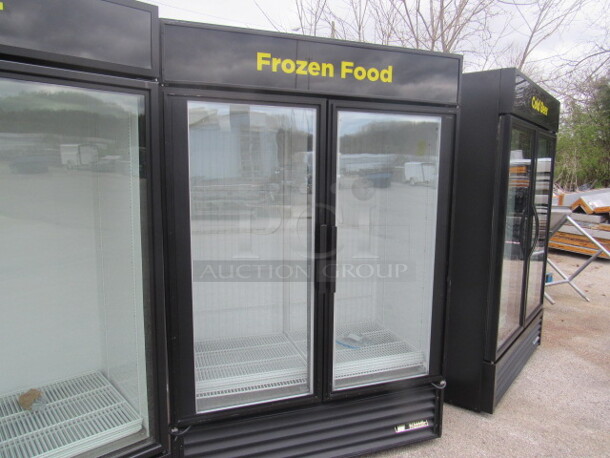 One 2 Door TRUE Freezer With 8 Racks. Model# GDM-49F. 115/208-230 Volt. 1 Phase. 54X30X78.5 Working.