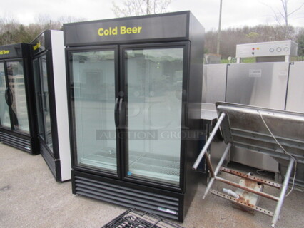 One TRUE 2 Door Glass Display Cooler With 8 Racks. 115 Volt. Model# GDM-49-HC-TSL01. 54X30X78.5. Working Not Cold.