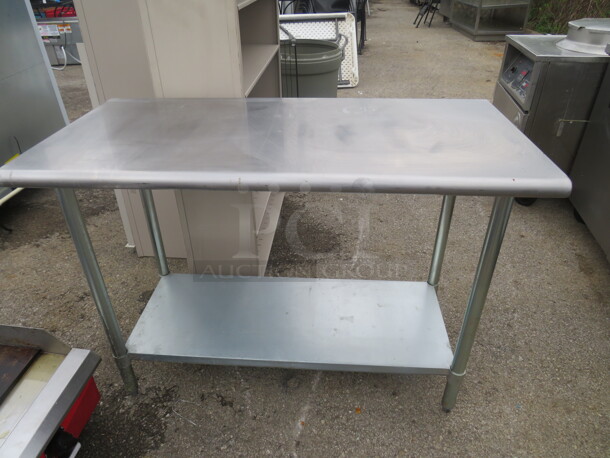 One Stainless Steel Table With Under Shelf. 48X24X34.5