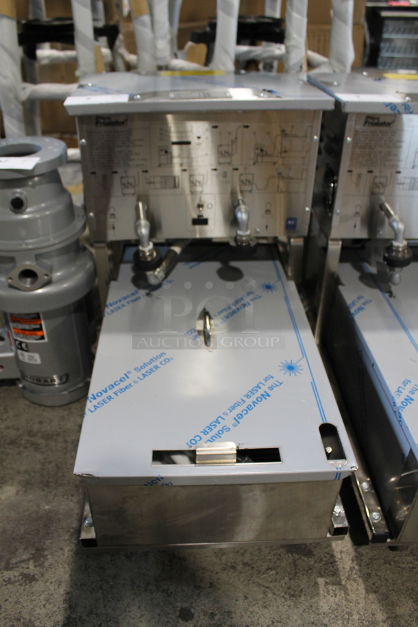 BRAND NEW SCRATCH AND DENT! 2023 Pitco Frialator P14 Stainless Steel Commercial  55 lb Fryer Oil Filtration System on Commercial Casters. 115 Volts, 1 Phase. 