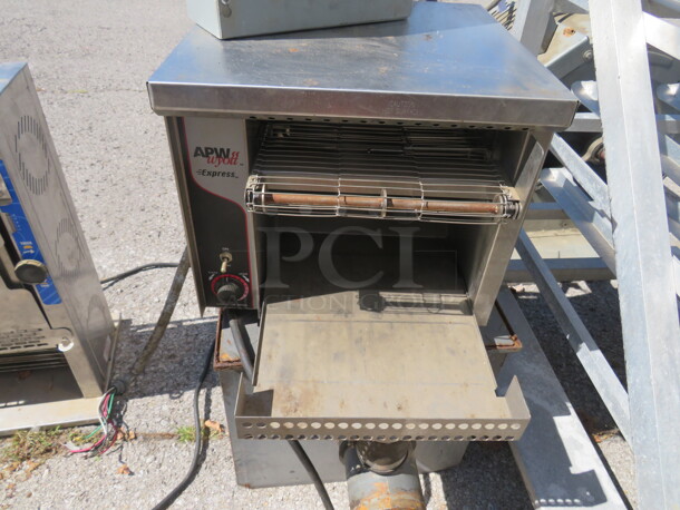One APW Wyott Conveyor Toaster. #AT-EXPRESS. 120 Volt. 1725 Watt. 15X22X13