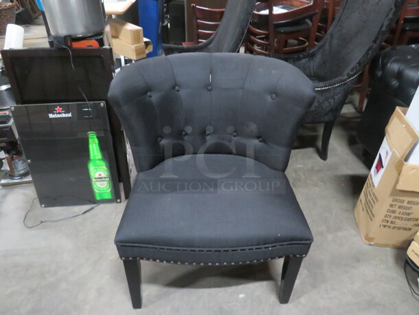 One Gray Cushioned Chair With Cushioned Round Back And Seat With Nailhead Trim. - Image 1 of 3