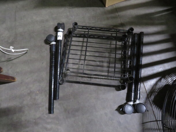 One Small Black Metro Shelf On Casters. Assembly Required. 12X15X20 - Image 1 of 1