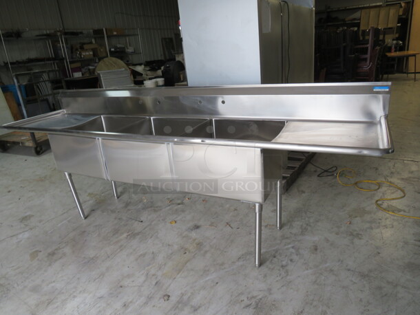 One NEW BK 3 Compartment Stainless Steel Sink With Back Splash And  R/L Drain Board. Model# BKS-3-24-14-24T.Sink 24X24X14. 120X29.5X44 - Image 1 of 4