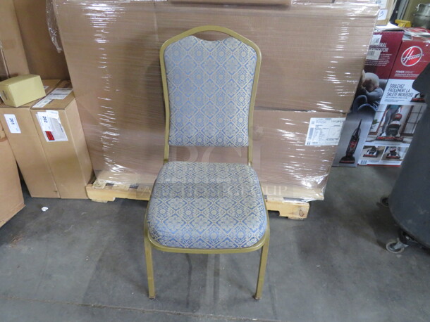 Gold Metal Stack Chair With Cushioned Seat And Back. 3XBID