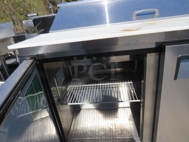One WORKING 2 Door Turbo Air Refrigerated Prep Table With 2 Racks, A Cutting Board On Casters. Model# MST-48. 115 Volt. 48X32X35 - Image 2 of 3