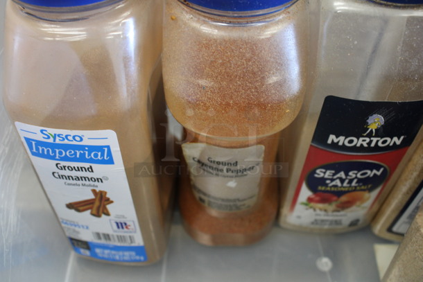 ALL ONE MONEY! Lot of 7 Containers of Various Spices; Cinnamon, Cayenne Pepper, 3 Season All and 2 Pepper. - Image 2 of 4