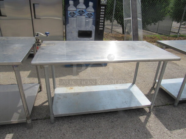 One Stainless Steel Table With Under Shelf And 10lb Can Opener. 60X30X34