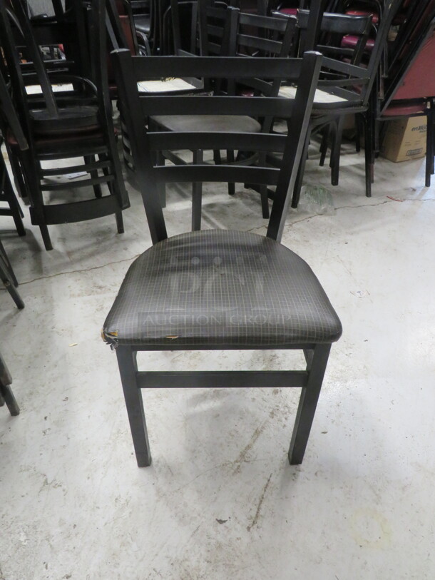 Black Metal Stack Chair With Cushioned Seat. 5XBID - Image 1 of 1