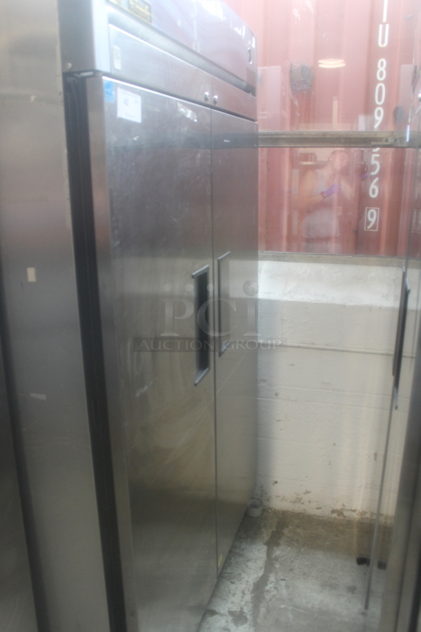 2012 True TG2R-2S ENERGY STAR Stainless Steel Commercial Two Door Reach In Cooler w/ Poly Coated Racks on Commercial Casters. 115 Volts, 1 Phase. Tested and Working! - Image 1 of 5