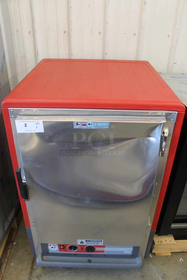 BRAND NEW SCRATCH AND DENT! 2023 Metro C5HLE015284 Stainless Steel Commercial Warming Cabinet on Commercial Casters. 120 Volts, 1 Phase. Tested and Working! - Image 1 of 6