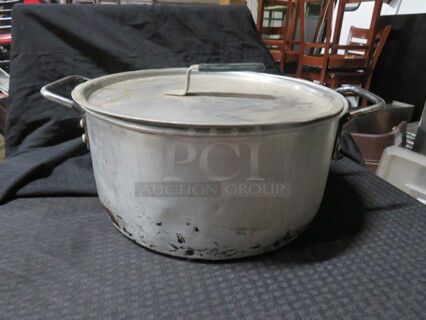 One Aluminum Stock Pot With Lid.