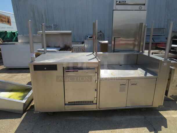 One Stainless Steel Workstation/Kiosk With Handsink, Faucet And Hot Water Heater, 2 Doors With Under Storage, 1 Door Cooler, Cash Drawer, and Flip Up SS Shelf, On Casters. 85X33X61 - Image 1 of 4