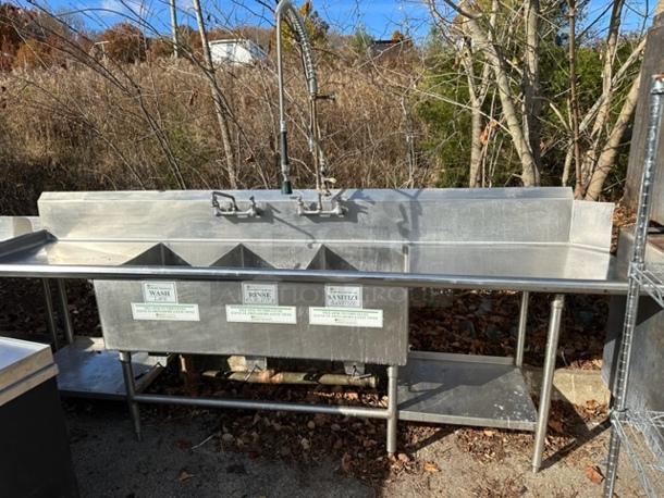 One Stainless Steel 3 Compartment Sink With Faucet And Hose Sprayer, R/L Drain Board, R/L Stainless Steel Under Shelf, And Back Splash. 120X31X46.5 - Image 1 of 3