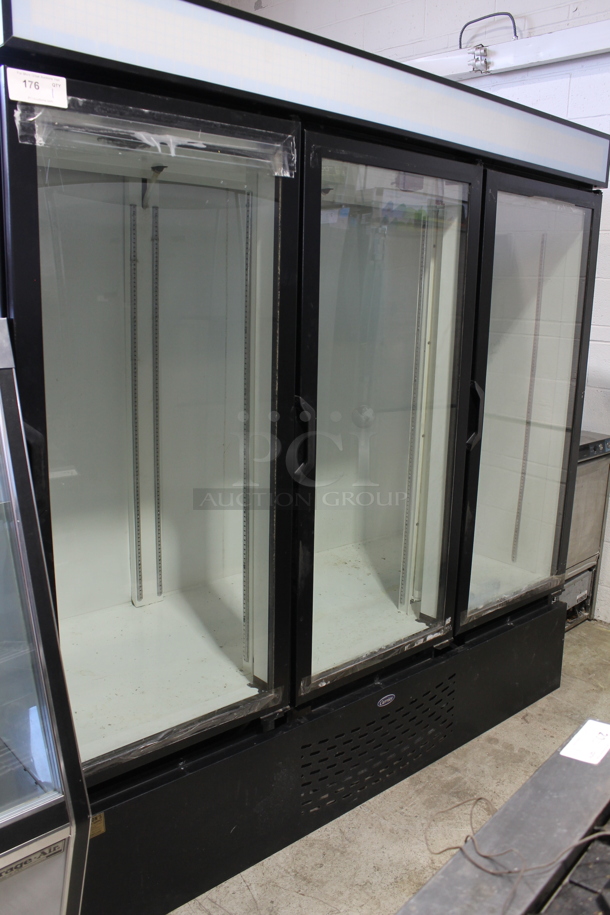 Carrier MC2000H Metal Commercial 3 Door Reach In Cooler Merchandiser. 115 Volts, 1 Phase. Tested and Powers On But Does Not Get Cold - Image 1 of 6