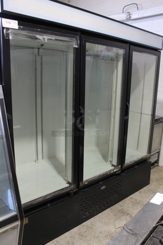 Carrier MC2000H Metal Commercial 3 Door Reach In Cooler Merchandiser. 115 Volts, 1 Phase. Tested and Powers On But Does Not Get Cold