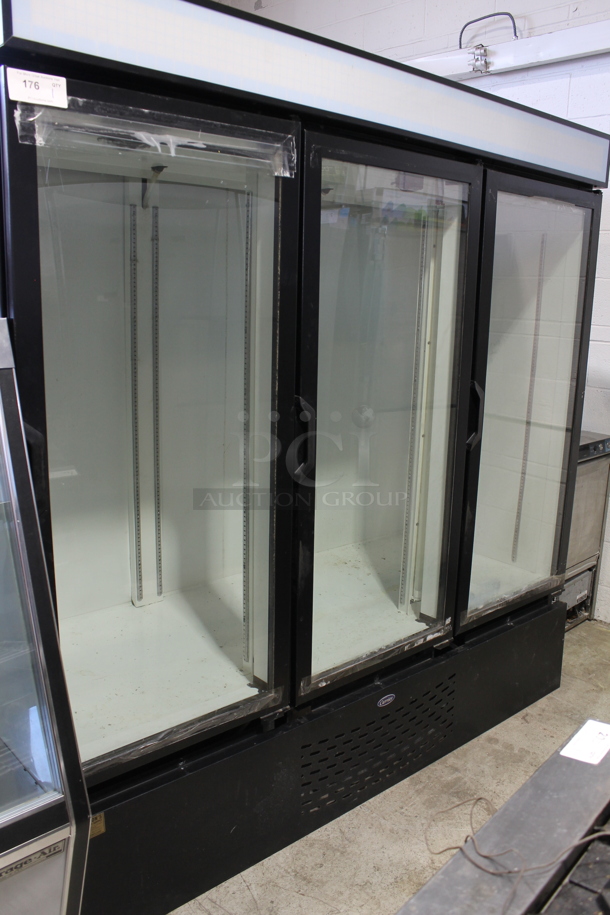 Carrier MC2000H Metal Commercial 3 Door Reach In Cooler Merchandiser. 115 Volts, 1 Phase. Tested and Powers On But Does Not Get Cold - Item #1097697