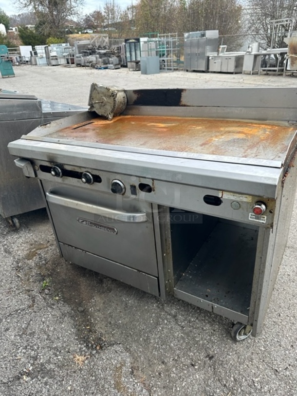 One Southbend Natural Gas Griddle Range On Casters. Model# 448AC-4T. $20,142.50.  - Image 1 of 1