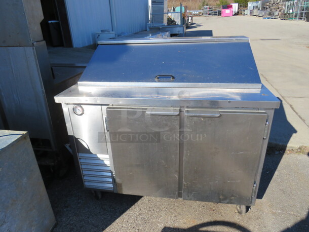 One Working 2 Door Refrigerated Prep Table With 2 Racks On Casters. 48X32X44