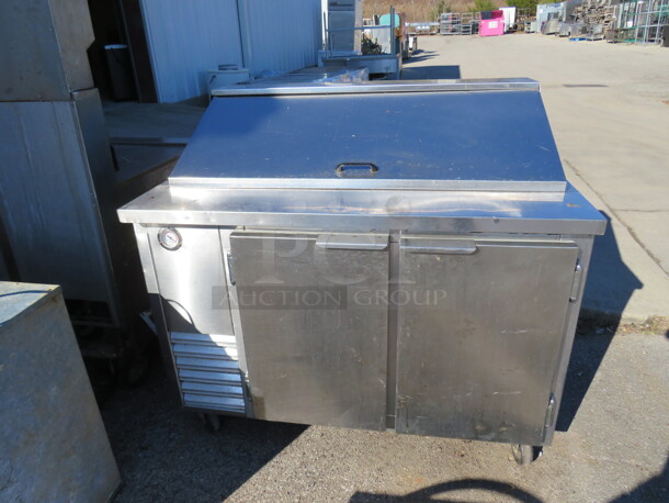 One Working 2 Door Refrigerated Prep Table With 2 Racks On Casters. 48X32X44 - Image 1 of 3