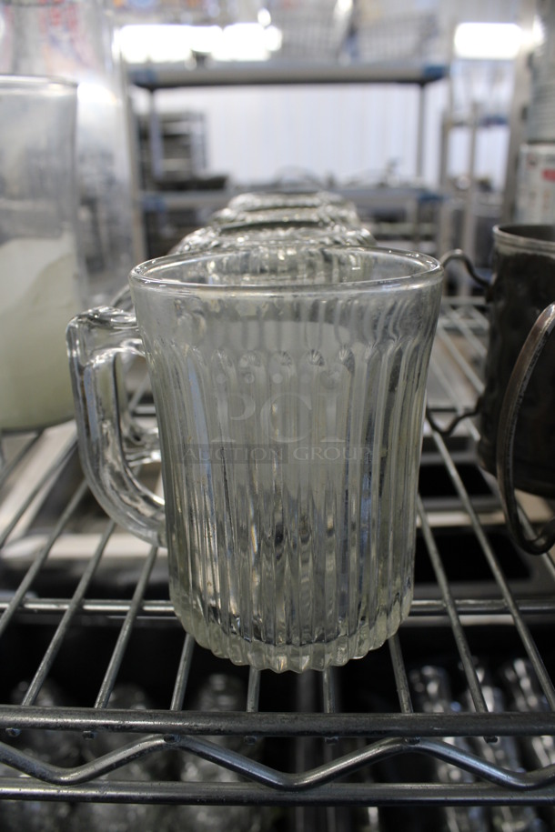 4 Glass Mugs. 4.5x3x4.5. 4 Times Your Bid!
