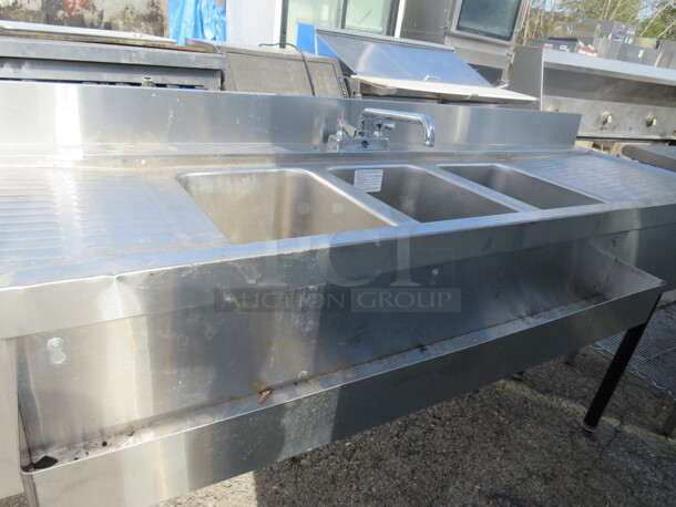 One Stainless Steel 3 Compartment Sink With Faucet, R/L Drain Board, 41 Inch Bottle Rail Attached. 71X26X38.5 - Image 2 of 2
