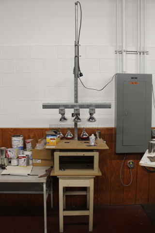 Wood Pattern Table w/ Metal Light Fixture. BUYER MUST REMOVE.