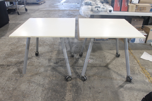 2 White Square Tables With Steel Legs On Commercial Casters. 2 Times Your Bid! 