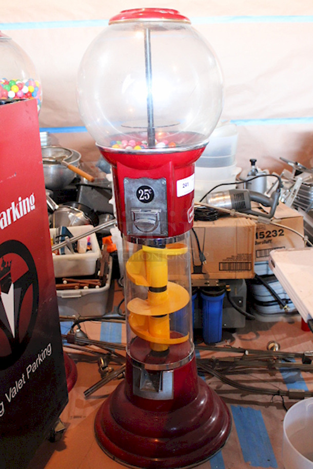 OFFICIAL! World Famous Magic Gumball International 5ft Large Spin and Drop Commercial Gumball Machine with Stand - Quarter Activated, Classic Red. TESTED! Works Perfect. Bowl & Housing Are Made From High Impact Clear As Crystal Fiber Glass. - Image 1 of 5
