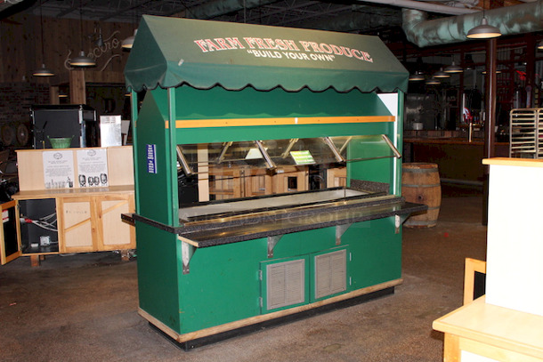 OUTSTANDING! Produce/Salad Bar With Drop In Cold-Well, Light, Counter and Glass Sneeze Guard, Solid Wood Frame With Canopy. In perfect working order.
89-1/2x53x93-1/2
 - Image 4 of 12