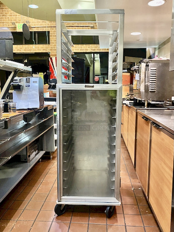 AMAZING! Lockwood CA72-RR12-6 Combination Open Air and Storage Display Cabinet With Removable Pan Support. 

9/10 Condition!

A versatile choice for cooling, storage and display with sheet pans
Construction: high tensile aluminum
Dimensions: 71-3/4"H x 22-7/8"W x 29-3/8"D
Center spacing: 3-1/4"
Pan capacity: supports (18) 18" wide pans (6 open air and 12 enclosed)
Casters: 5" non-marking swivel plate (2 with brakes)
Actual Weight: 120 lbs. - Image 1 of 8