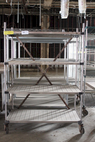 Metro Rack, 4 Solid removable Shelves On commercial Casters, 48x24x68